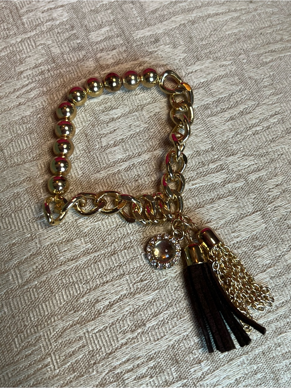 Gold Beaded Charm Bracelet with Brown Tassel